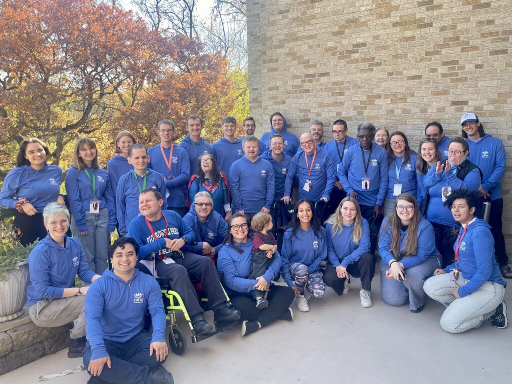 A group of L'Arche members and volunteers who attend the fall retreat in 2022