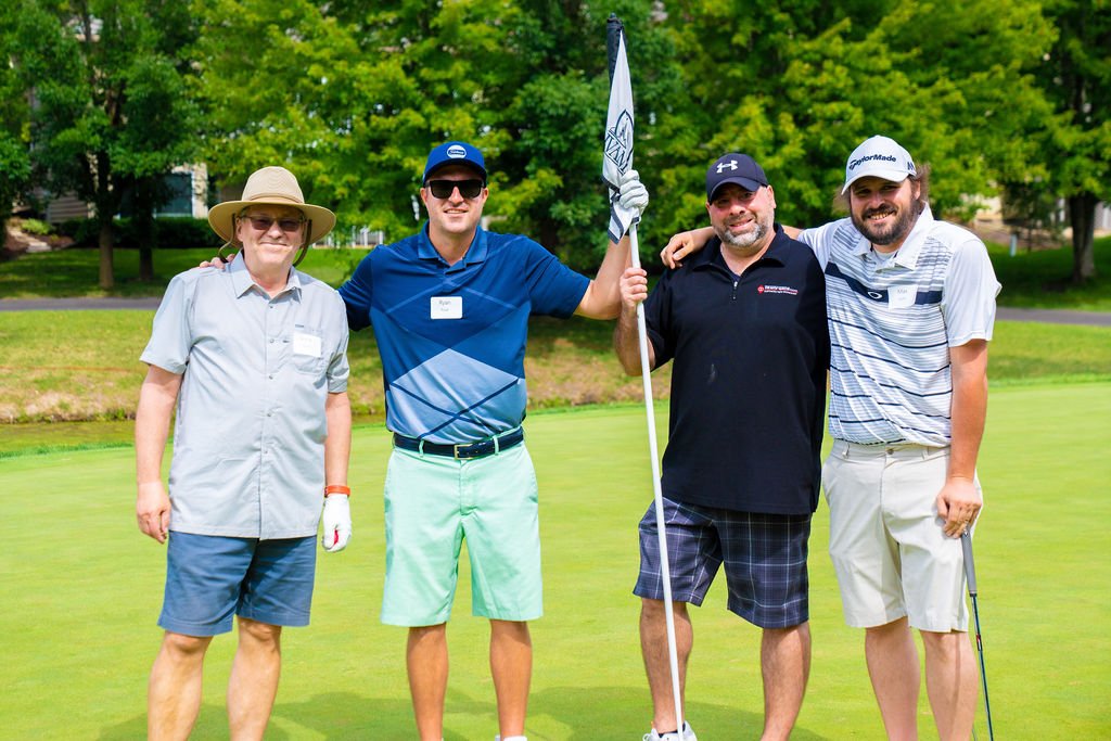 4 attendees of the L'Arche Chicago Golf outing 2022